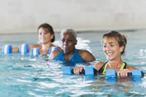 Three women in a hydrotherapy pool